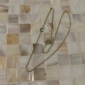 Gold “C” necklace